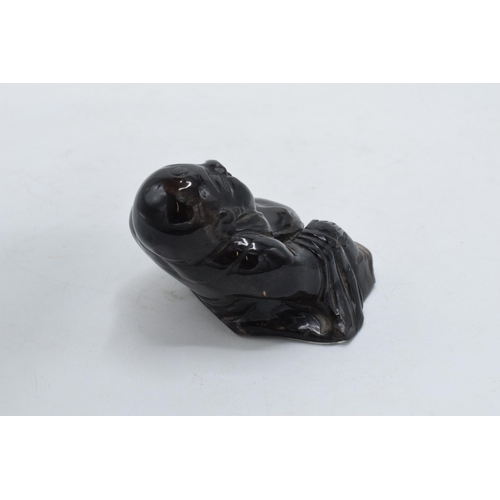 194 - Chinese obsidian buddha figure, 7cm wide.