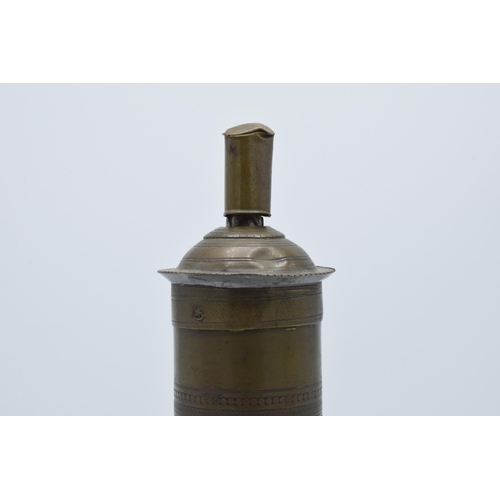 196 - 19th century brass Arabic cylindrical spice grinder, 29cm long.