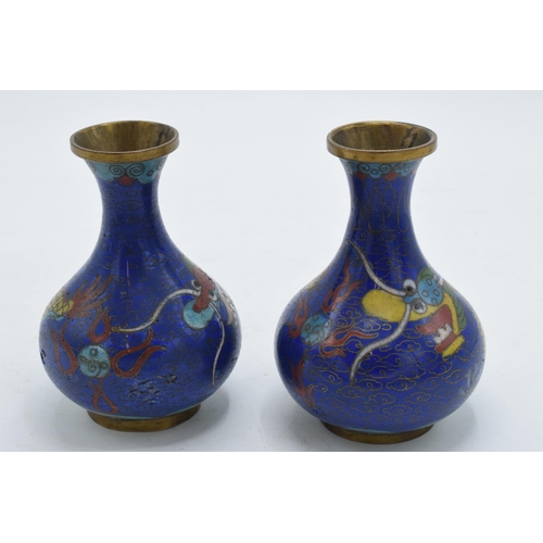 198 - A pair of Japanese Cloisonné vases with dragon decoration on a dark blue background, 1 with damage, ... 