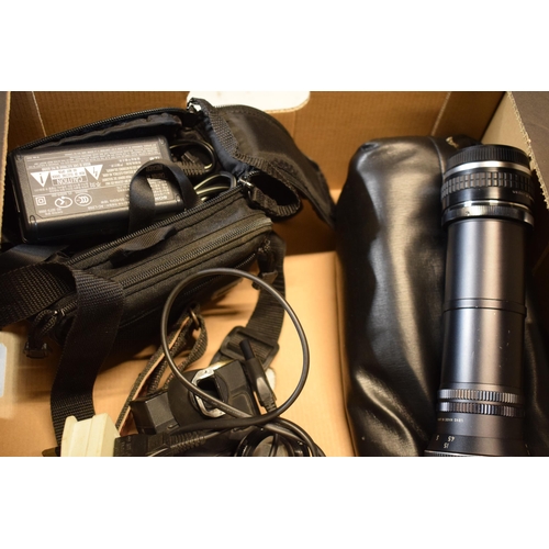 231 - A collection of cameras and equipment to include Olympus 2X OP Teleplus MC4 lens, Olympus OM10, Niko... 