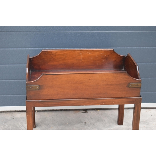 233 - A 20th century wooden butler's tray on stand or similar with brass bounds, 67 x 43 x 69cm tall.