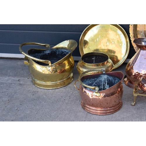 234 - A collection of quality brass and copper items to include brass coal scuttles, large Eastern charger... 