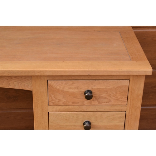 239 - Heavy oak kneehole desk flanked by a set of drawers, 107 x 46 x 76cm tall.