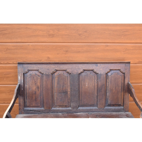 240 - 18th century oak settle with panelled back support, 107 x 46 x 76cm tall.