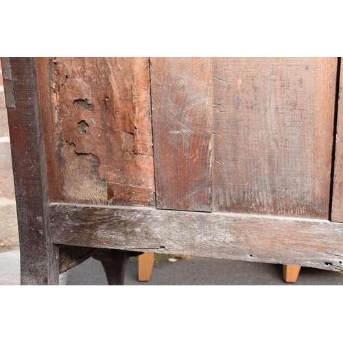 240 - 18th century oak settle with panelled back support, 107 x 46 x 76cm tall.