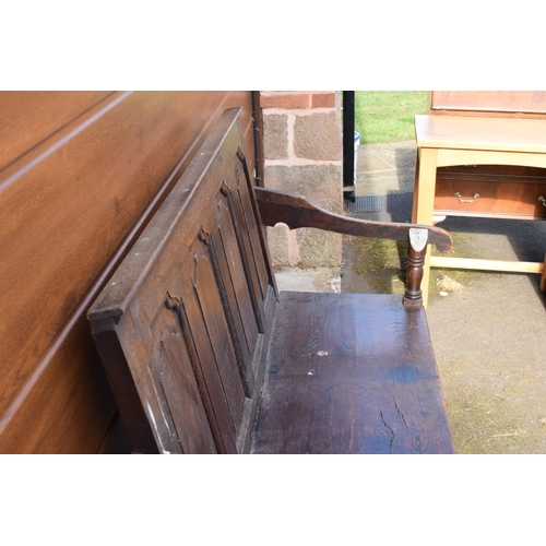 240 - 18th century oak settle with panelled back support, 107 x 46 x 76cm tall.