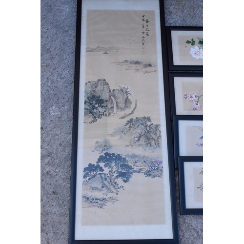 246 - A collection of 20th century oriental paintings on silk in black frames of varying scenes and sizes,... 