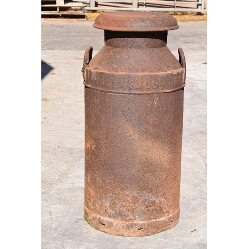 250 - A vintage early to mid 20th century milk churn. 72.5cm tall.