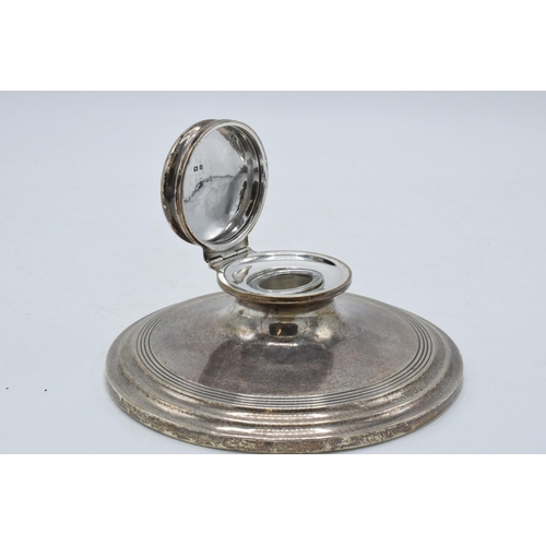 266 - Silver circular inkwell with glass liner, monogram to top of lid. Birmingham 1907. 15cm diameter.