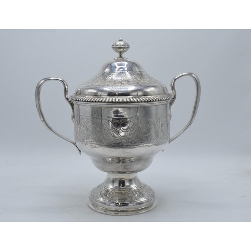 269 - Silver plated double-handled trophy / lidded urn Dutchess of Sutherland Cripples Guild, 28cm tall.