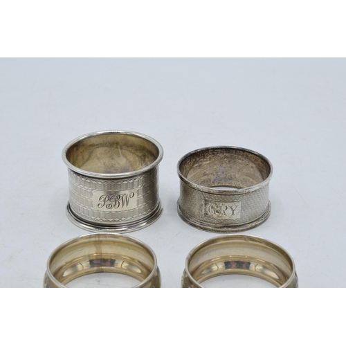 274 - 4 hallmarked silver napkin rings to include a pair, Chester 1923, one Birm 1924 and Birm 1921 (4). 4... 