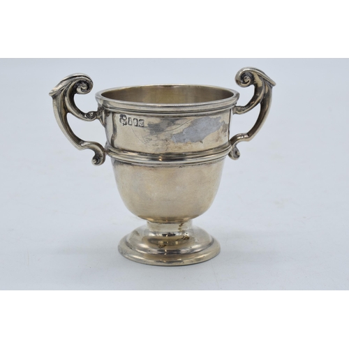 281 - Miniature hallmarked silver trophy, 50.7 grams, Dublin 1900. 6cm tall.