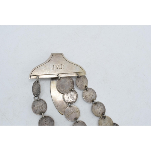 327 - Silver plated love token chatelaine with silver coins, 22cm long.