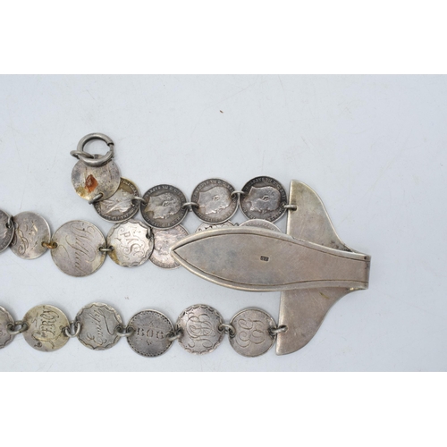 327 - Silver plated love token chatelaine with silver coins, 22cm long.