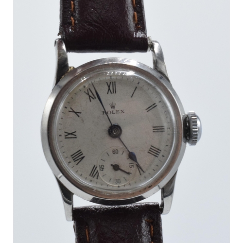 359 - Rolex watch on leather strap, circa 1930s / 1940s, in ticking order, 28mm wide. Solder repair to top... 