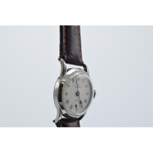 359 - Rolex watch on leather strap, circa 1930s / 1940s, in ticking order, 28mm wide. Solder repair to top... 