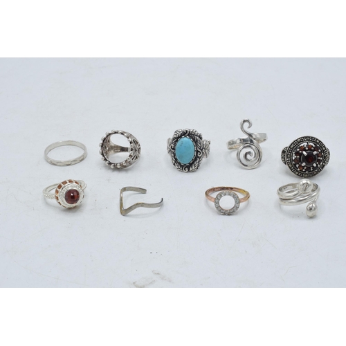 361 - A collection of silver rings of varying forms and sizes, 48.6 grams (9).