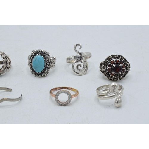 361 - A collection of silver rings of varying forms and sizes, 48.6 grams (9).