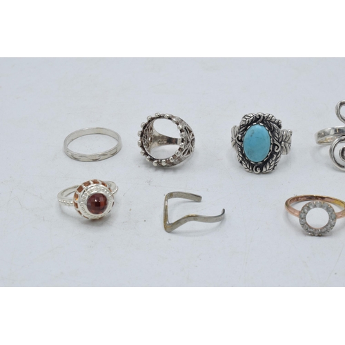 361 - A collection of silver rings of varying forms and sizes, 48.6 grams (9).