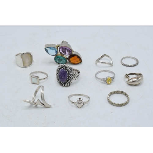 363 - A collection of silver rings of varying forms and sizes, 43.4 grams (10).