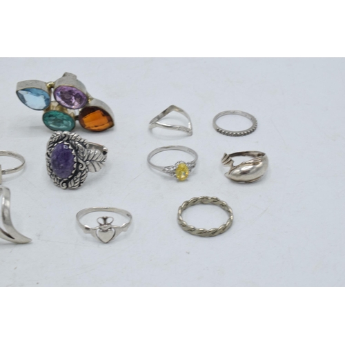 363 - A collection of silver rings of varying forms and sizes, 43.4 grams (10).