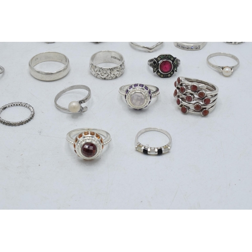 364 - A collection of silver rings of varying forms and sizes, 61.5 grams (16).