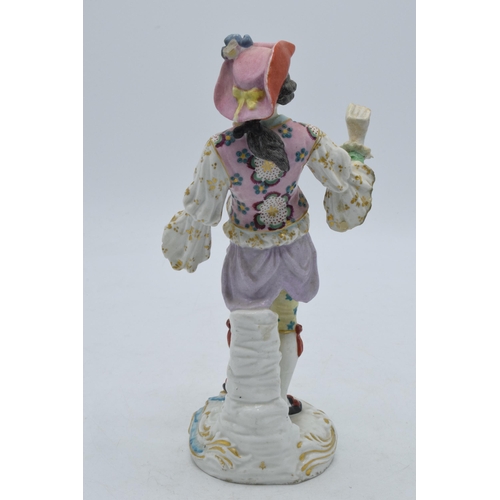 45 - 19th century continental figure, in the style of Meissen, Chelsea or Derby, of a gentleman wearing a... 