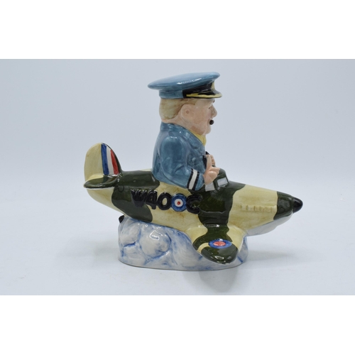 81 - Bairstow Manor Collectables comical model of Winston Churchill in a spitfire. 20cm tall.