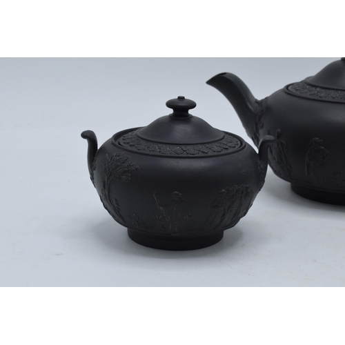 94 - Wedgwood Black Basalt tea set to include tea pot, creamer and lidded sugar (3).