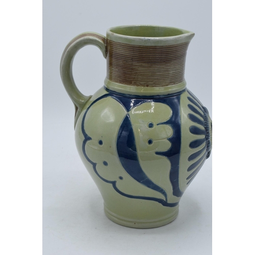 95 - Wedgwood stoneware jug imitating Westerwald with Queen's Head, 21cm tall.