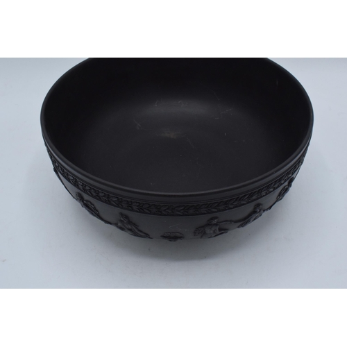 96 - Wedgwood black basalt footed fruit bowl decorated with Dancing Hours design, diameter 25cm.