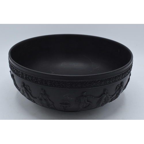 96 - Wedgwood black basalt footed fruit bowl decorated with Dancing Hours design, diameter 25cm.