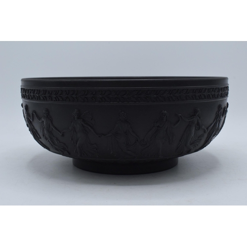 96 - Wedgwood black basalt footed fruit bowl decorated with Dancing Hours design, diameter 25cm.