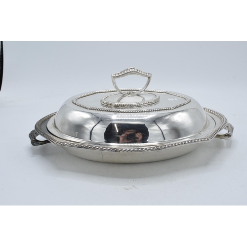 312 - Early 20th century silver plated entrée dish with kay handle to lid, 32cm long.