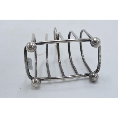 315 - Silver plated arched toast rack with 5 bars, 8cm long.