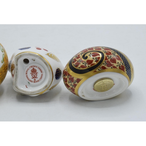 39A - A trio of Royal Crown Derby Paperweights to include  Dormouse (sleeping), Harvest Mouse and Country ... 