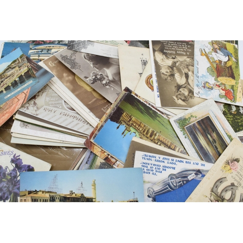 305 - A mixed collection of postcards to date from late 19th century with later examples too featuring a m... 