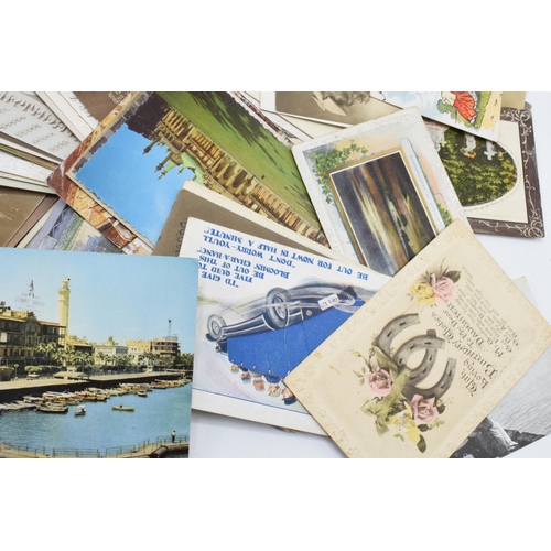 305 - A mixed collection of postcards to date from late 19th century with later examples too featuring a m... 