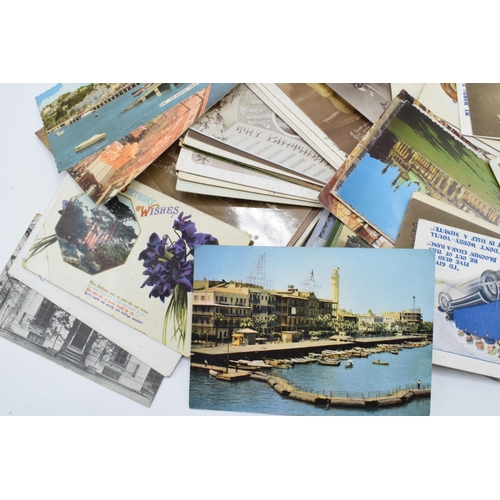 305 - A mixed collection of postcards to date from late 19th century with later examples too featuring a m... 