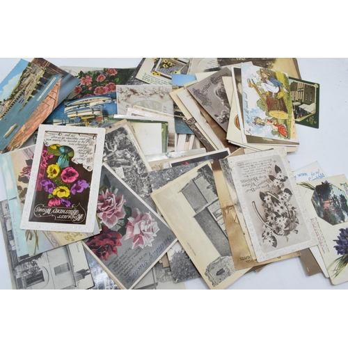 305 - A mixed collection of postcards to date from late 19th century with later examples too featuring a m... 