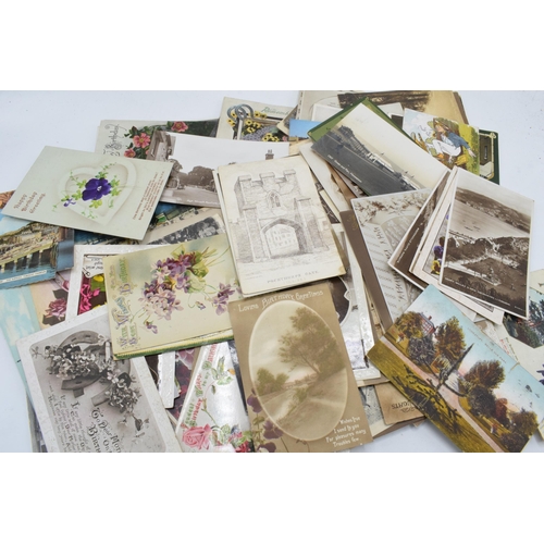 305 - A mixed collection of postcards to date from late 19th century with later examples too featuring a m... 