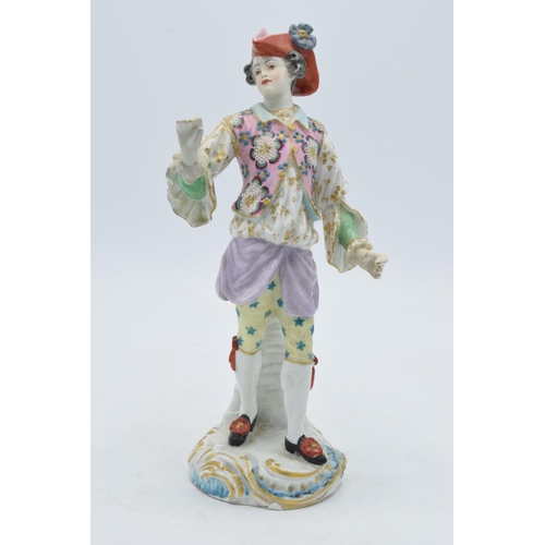 82A - 19th century continental figure, in the style of Meissen, Chelsea or Derby, of a gentleman wearing a... 