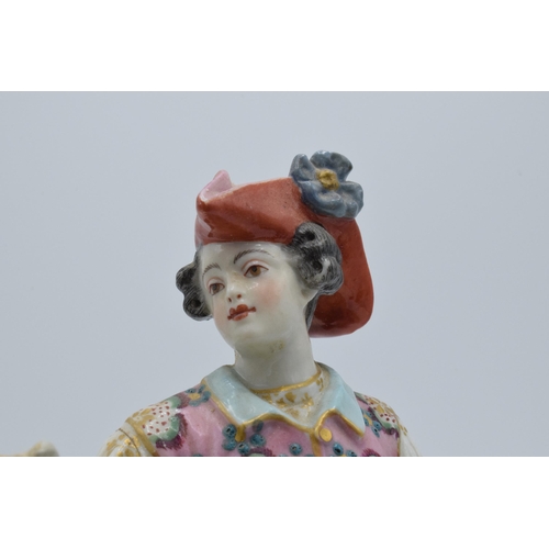 82A - 19th century continental figure, in the style of Meissen, Chelsea or Derby, of a gentleman wearing a... 