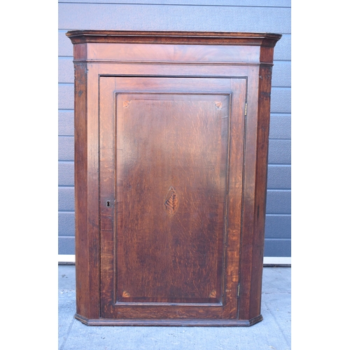 375 - 19th century inlaid corner cupboard with shell motif and corners with working lock and key, 107cm ta... 