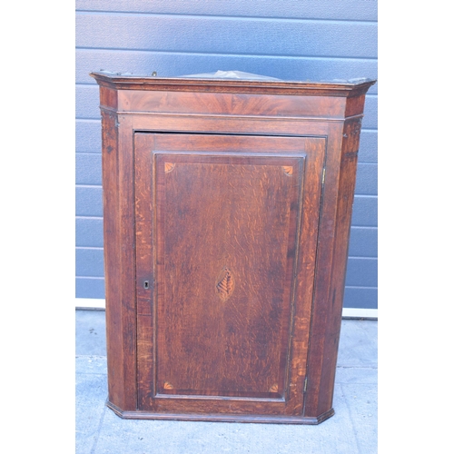 375 - 19th century inlaid corner cupboard with shell motif and corners with working lock and key, 107cm ta... 