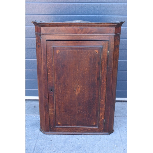 375 - 19th century inlaid corner cupboard with shell motif and corners with working lock and key, 107cm ta... 