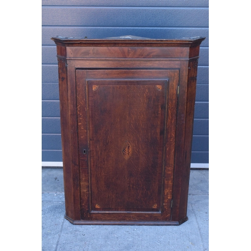 375 - 19th century inlaid corner cupboard with shell motif and corners with working lock and key, 107cm ta... 