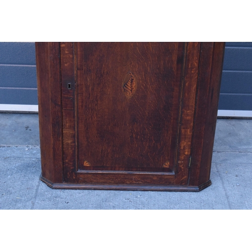 375 - 19th century inlaid corner cupboard with shell motif and corners with working lock and key, 107cm ta... 