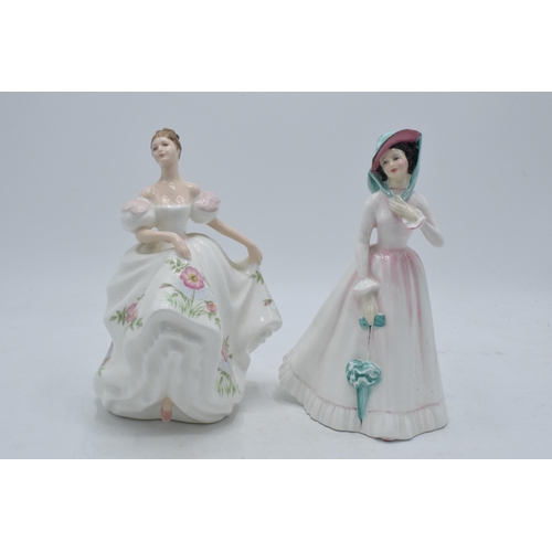 134 - A pair of Royal Doulton lady figures to include Julia HN2706 and Lucy HN3653 (2).