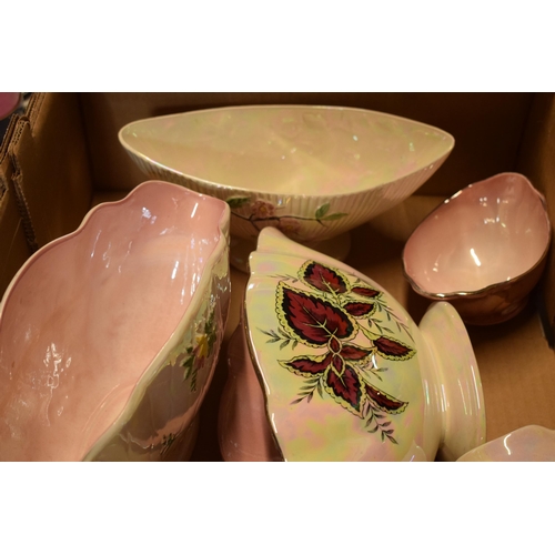 14 - A collection of Maling pink lustre pottery to include flower bowls, jugs and a dish (6).